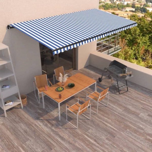 Toldo retráctil manual azul y blanco 600x350 cm