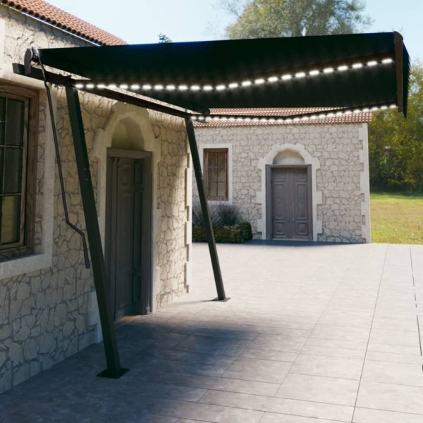 Toldo retráctil manual con LED gris antracita 4,5x3 m